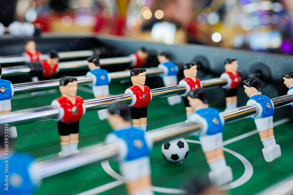 Table football in a modern game room in close-up. Table football in a modern game room in close-up.