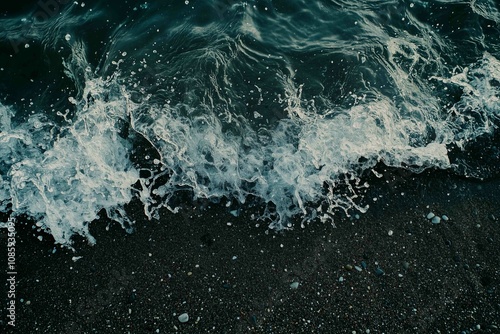 Wallpaper Mural Drone aerial view of the sea or ocean waves splashing on a dark navy blue or gray sand beach with beautiful transparent clear water
 Torontodigital.ca