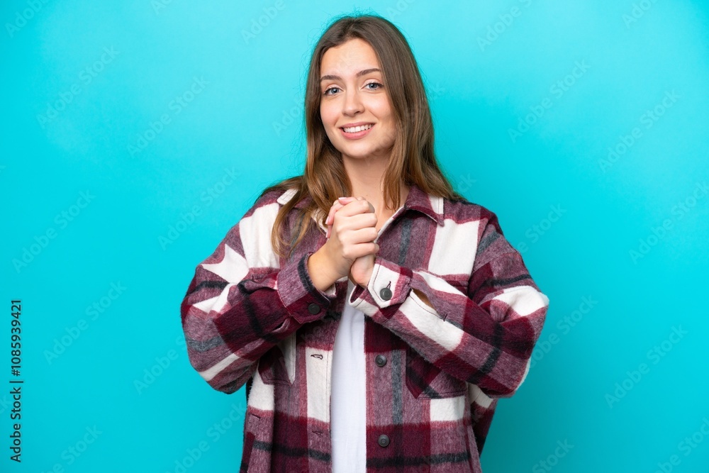 Young caucasian woman isolated on blue background laughing Young caucasian woman isolated on blue background laughing