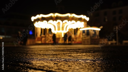 Amusement Park Vintage Carousel Spinning at Night photo