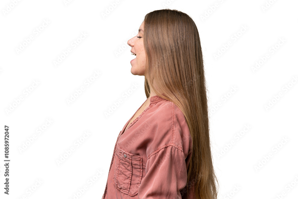 Young beautiful blonde woman over isolated background laughing in lateral position Young beautiful blonde woman over isolated background laughing in lateral position
