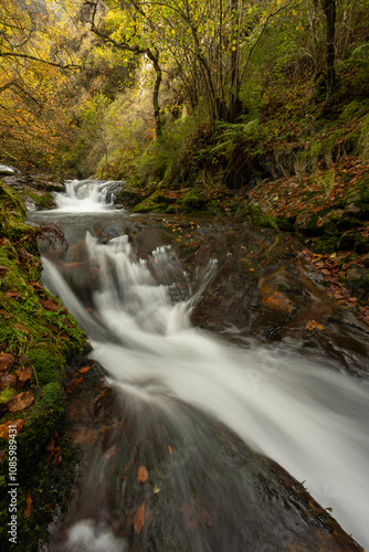 Infierno River waterfalls in autumn, on the Pexanca route, Infiesto, Asturias, Spain photo