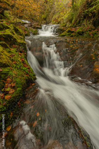 Infierno River waterfalls in autumn, on the Pexanca route, Infiesto, Asturias, Spain photo