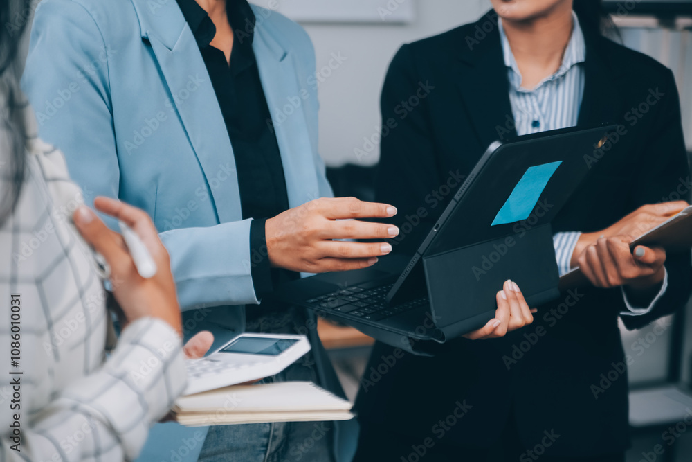 Fund managers team consultation and discuss about analysis Investment stock market at office