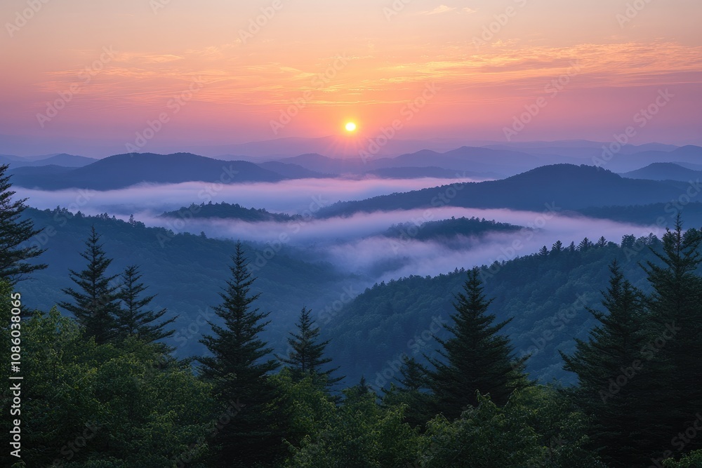 Sun rising over foggy mountains in the great smoky mountains national park Sun rising over foggy mountains in the great smoky mountains national park