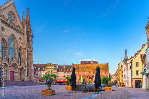 Quadro em tela Temple Saint-Etienne, Hotel de Ville City hall, colorful buildings and street re