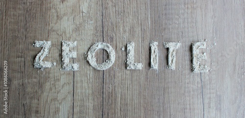 Zeolite powder on a wooden board. 