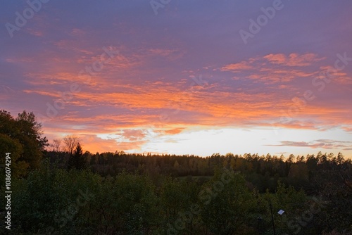 Magical sunset in winter in January over Bredebolet in Skaraborg in Vaestra Goetaland in Sweden on a cold day