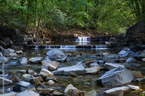 Obraz na płótnie Crumbling weir on a river after a flood. Juhyne. Czechia. w salonie
