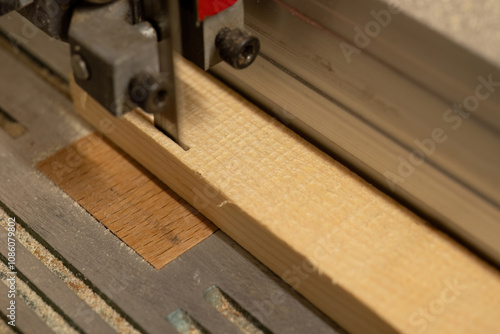 Woodworking Bandsaw Cutting Wooden Plank
