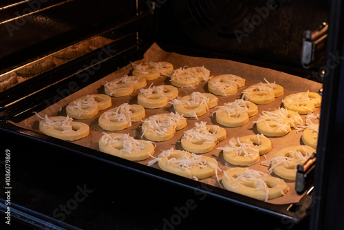 Canvastavla Cheese-Topped Pretzels Baking in Oven