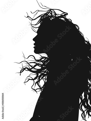 Woman with long hair is shown in a black and white photo. The hair is styled in a way that it is blowing in the wind. The photo has a moody and dramatic feel to it