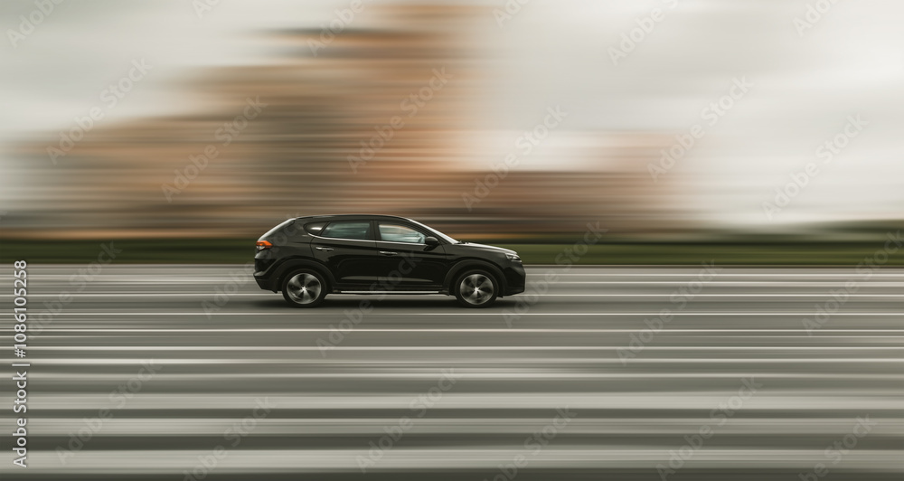 Fototapeta premium Black car on a blurred background