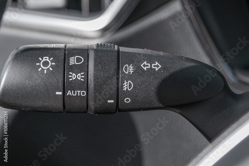 Car turn signal switch with light switch