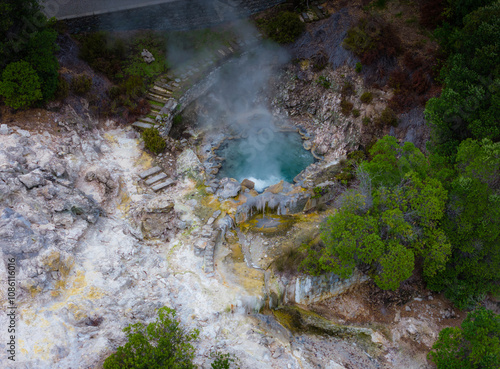 Furnas hot thermal springs, Sao Miguel Island, Azores, Portugal. Aerial drone view of Furnas village and Caldeira do Asmodeu photo