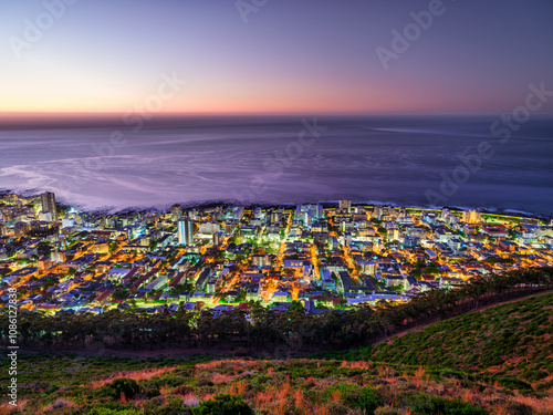 Night view of Sea Point and Fresnaye lit up, from Signal Hill, Cape Town, South Africa photo