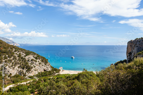 Fototapeta Naklejka Na Ścianę i Meble -  Cala Luna, Sardinia, Italy. View of the turquoise Mediterranean Sea from a hill on the Gulf of Orosei hiking trail. Awesome Sardinian landscape.