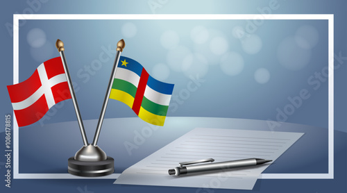 Denmark and Central African Republic National flags on small table with bokeh background, cooperative relationship