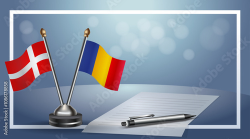 Denmark and Chad National flags on small table with bokeh background, cooperative relationship