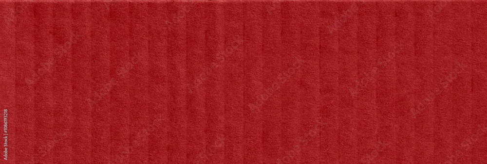 Fototapeta premium Red cardboard texture with a festive Christmas touch