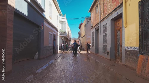 Video shows the aftermath of the flood. Captured are damaged homes, road and the efforts of residents and volunteers to clean and rebuild. photo