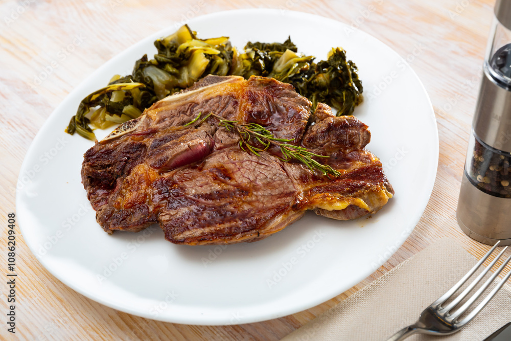 Top view on grilled beef with chard Top view on grilled beef with chard