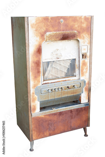 Old rusty candy vending machine with coin slots to choose which candy you prefer. Machine has legs, slots, windows. Antique  display no longer offers candy. It is rusted & out of order. photo