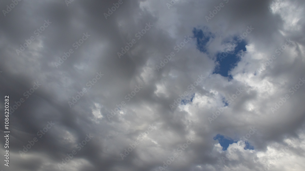 Beautiful dark dramatic sky with stormy clouds before rain or snow. Thunderstorm heaven landscape. Timelapse. High quality photo Beautiful dark dramatic sky with stormy clouds before rain or snow. Thunderstorm heaven landscape. Timelapse. High quality photo