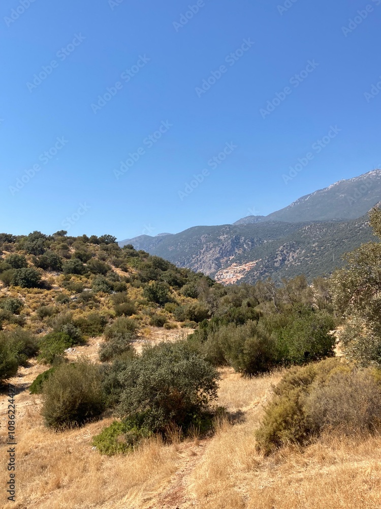 A stunning panoramic view of Kaş, a charming coastal town located on the Mediterranean in southern Turkey. A stunning panoramic view of Kaş, a charming coastal town located on the Mediterranean in southern Turkey.
