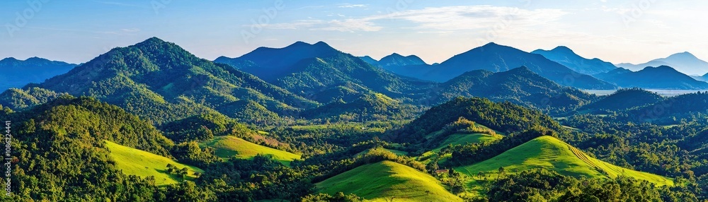 A breathtaking panorama of lush green mountains under a clear blue sky, showcasing the beauty of nature and the serenity of the landscape. A breathtaking panorama of lush green mountains under a clear blue sky, showcasing the beauty of nature and the serenity of the landscape.