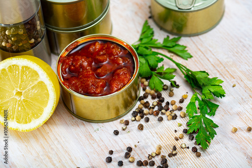 Close up of canned sauced calmary ready to eat photo