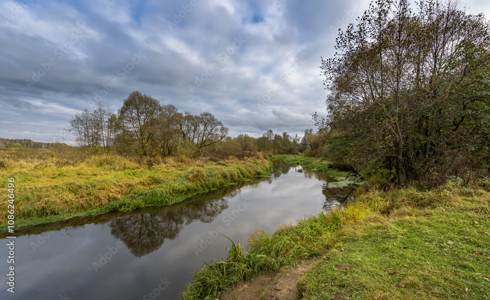 A river with trees on either side A river with trees on either side
