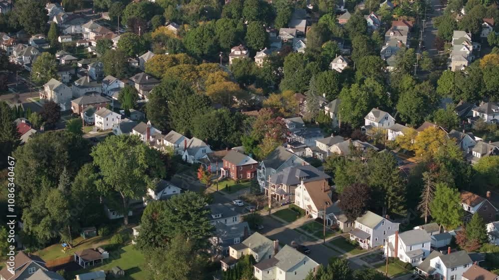 Aerial view of homes in Binghamton, New York. Shot in the west end on a summer evening. Aerial view of homes in Binghamton, New York. Shot in the west end on a summer evening.