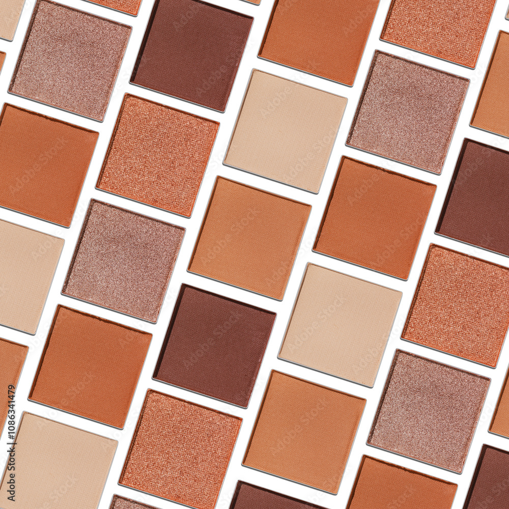 Fototapeta premium Eyeshadow palette, mix of matte and shimmer shades in brown, nude, orange hues. Aesthetic top view pattern for beauty, makeup, cosmetics themes, Neutral colored swatches eyeshade refills