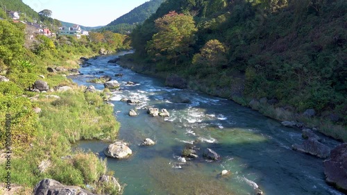 A clear stream in the middle of nature, Okutama, Tokyo photo