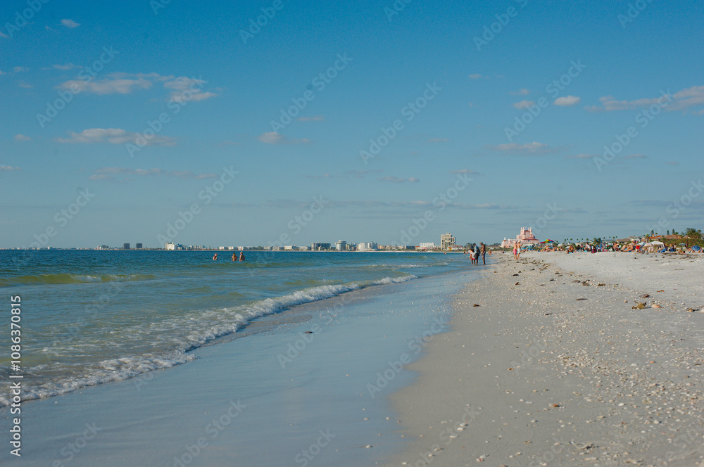 Wide view north Leading Lines St. Pete Beach, FL, Pass-a-Grille beach after Hurricanes Helene and Milton beside the Gulf of Mexico. People on beach Sand dune beach renourishment. Near sunset sunshine Wide view north Leading Lines St. Pete Beach, FL, Pass-a-Grille beach after Hurricanes Helene and Milton beside the Gulf of Mexico. People on beach Sand dune beach renourishment. Near sunset sunshine