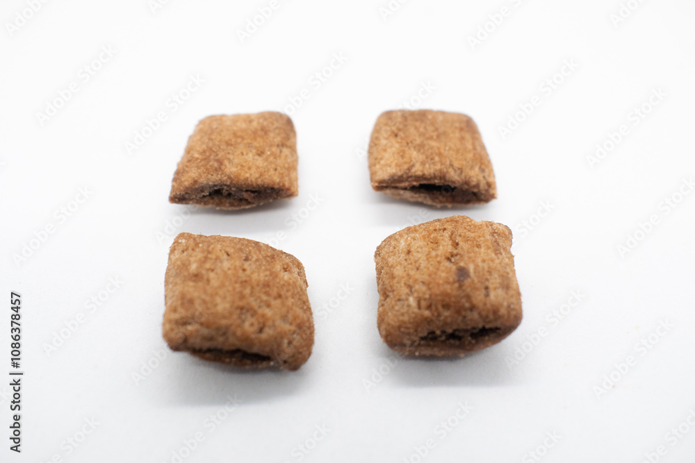 Chocolate pillow wafer snack isolated on white background