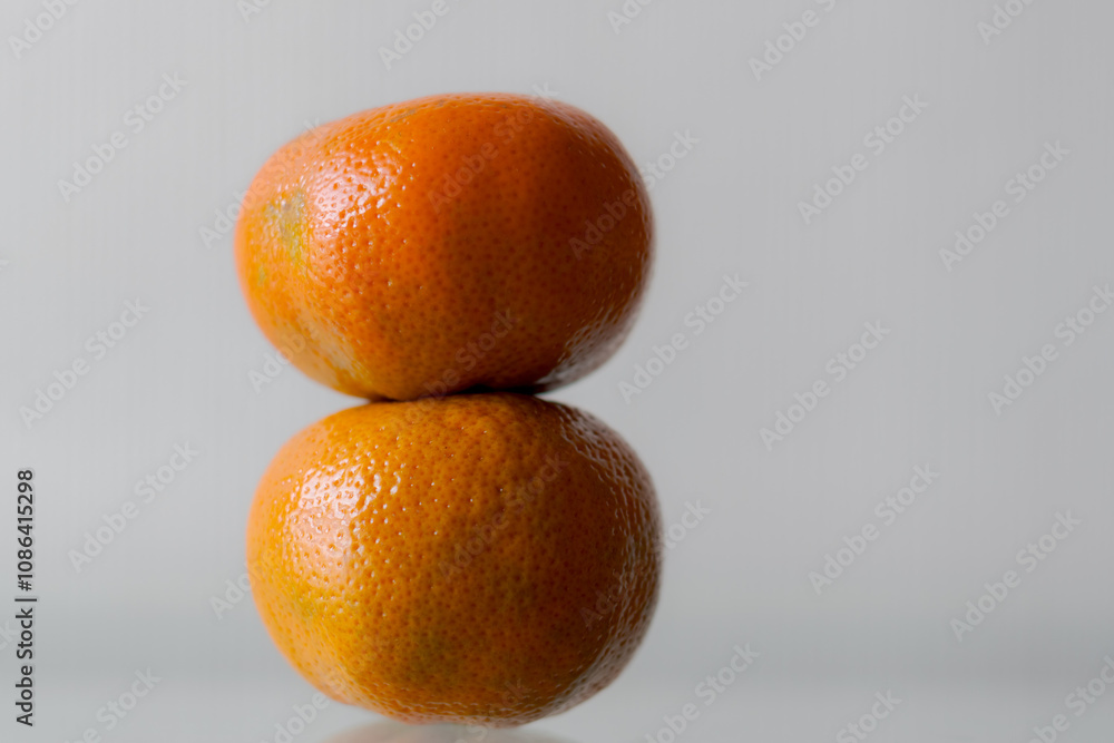 Mandarin Stacked on Another Mandarin Stacked on Another