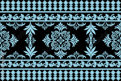 Blue Damask Pattern, on black background, delicate and intricate damask pattern in blue hues creates a seamless background for elegant designs, invitations, and wallpapers. The intricate