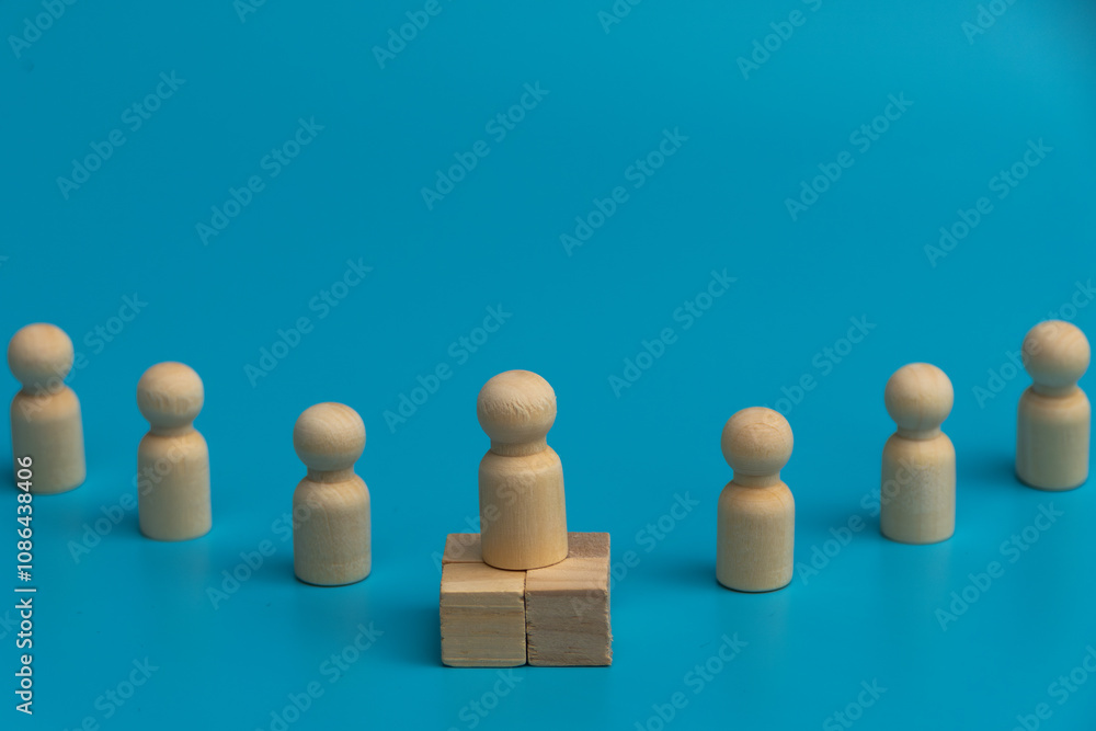 Wooden figures, a symbol of shared purpose. A quiet contemplation of collective action. Individuality amidst the group. A visual representation of professional growth. Wooden figures, a symbol of shared purpose. A quiet contemplation of collective action. Individuality amidst the group. A visual representation of professional growth.