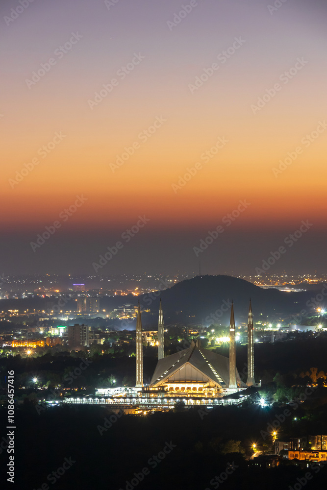 The Faisal Mosque is the national mosque of Pakistan, located in the capital city, Islamabad. It is the fifth-largest mosque in the world. The Faisal Mosque is the national mosque of Pakistan, located in the capital city, Islamabad. It is the fifth-largest mosque in the world.
