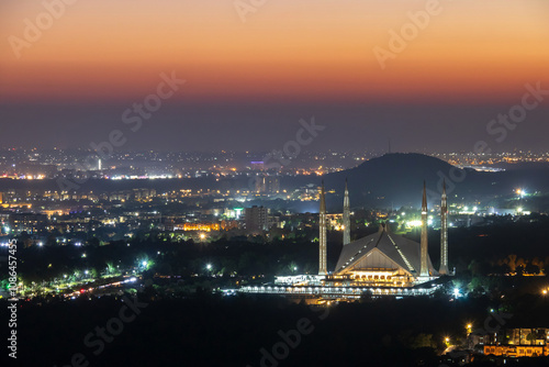 The Faisal Mosque is the national mosque of Pakistan, located in the capital city, Islamabad. It is the fifth-largest mosque in the world. photo