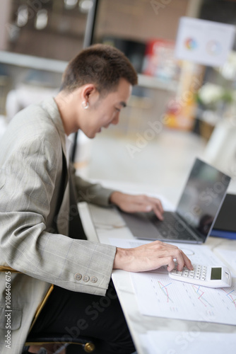 Business man working using laptop computer Hands typing keyboard. Professional investor working start up project. business planning in office. Technology business