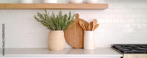 Integrated appliances in a modern kitchen with open shelving, bright subway tile backsplash, minimalist decor, soft natural light, and a cozy, airy feeling