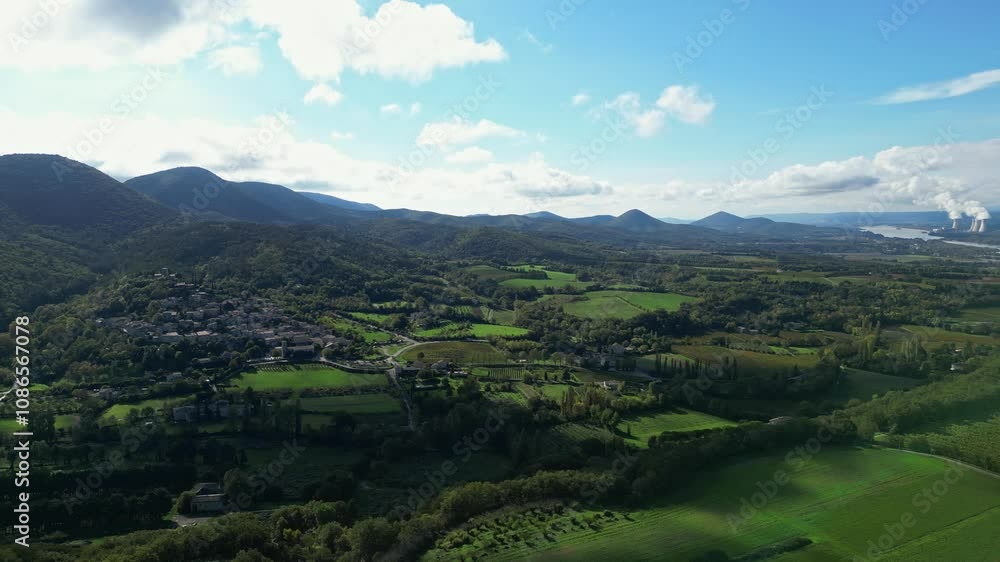 Mirmande, France - 1 November 2024: Panoramic view on a sunny day of the town of Mirmande - one of the most beautiful old towns in France. In the Rhones Alpes - Drome area. Mirmande, France - 1 November 2024: Panoramic view on a sunny day of the town of Mirmande - one of the most beautiful old towns in France. In the Rhones Alpes - Drome area.