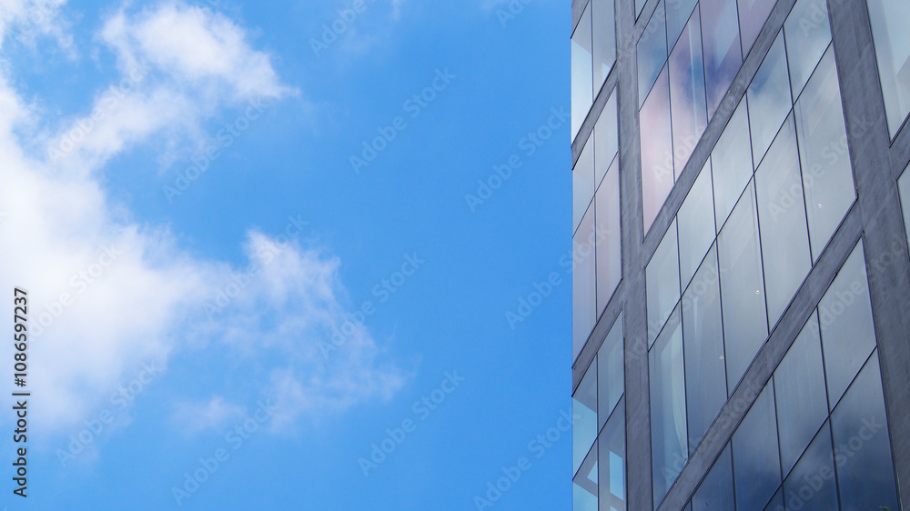 Abstract architecture background, minimalist top of building detail against blue sky for use as art, background or copyspace Abstract architecture background, minimalist top of building detail against blue sky for use as art, background or copyspace