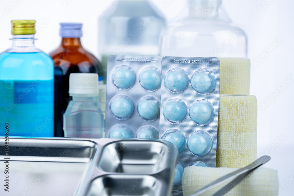 Medical equipment for treating infections. Wound care dressing set. Medical supplies for nurses. Conform bandage, forceps, cotton ball with alcohol. Sterile dressing materials. Healthcare equipment. Medical equipment for treating infections. Wound care dressing set. Medical supplies for nurses. Conform bandage, forceps, cotton ball with alcohol. Sterile dressing materials. Healthcare equipment.