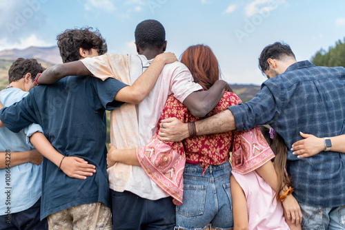 Photography Young diverse friends embracing in nature showing multicultural community friend
