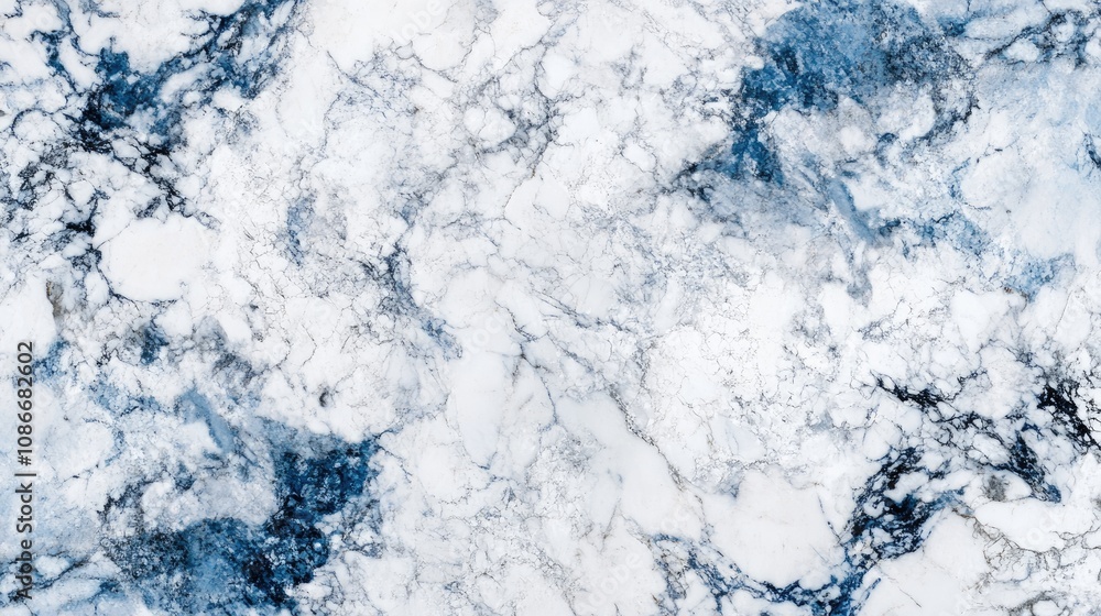 Marbled stone surface with bright white and intricate blue patterns, showcasing swirling textures and a polished finish, ideal for elegant backgrounds. Marbled stone surface with bright white and intricate blue patterns, showcasing swirling textures and a polished finish, ideal for elegant backgrounds.