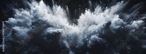 The white powder was exploding in the air, creating an epic visual effect with a black background. The explosion is a spectacular display of light and shadow, showcasing stunning details.